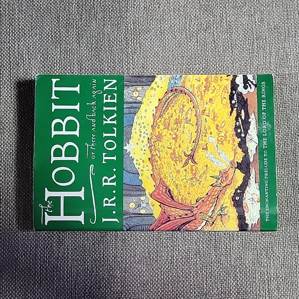 Author- J.R.R. TOLKIEN. Title- The Hobbit back has little damage on cover